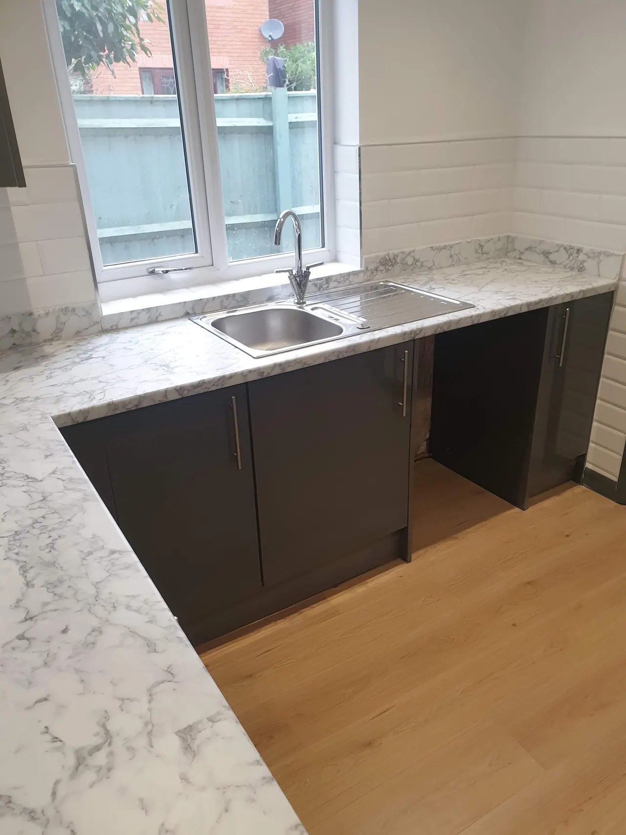 Completed sink, tap and worktop installation